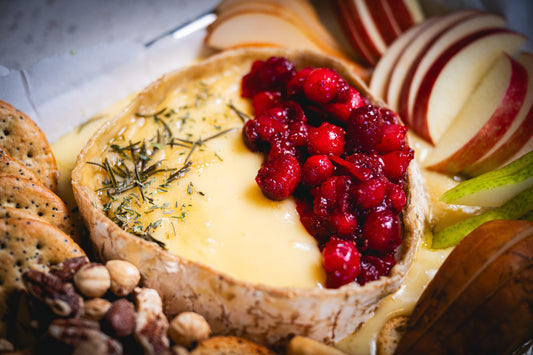Smoked (or Oven-Baked) Brie with Rosemary, Thyme & Cranberry Sauce
